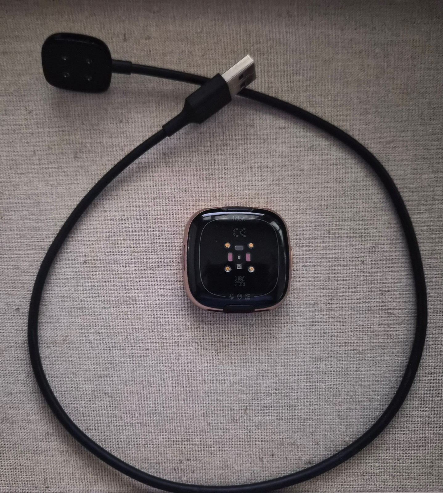 Fitbit Versa 4 Fitness Smartwatch - Pebble & Charging Cord — photo 2